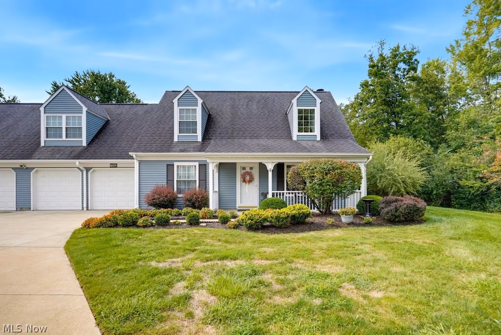 Cape Cod home with dormers at 7592 Andrea Dr, Mentor, Ohio